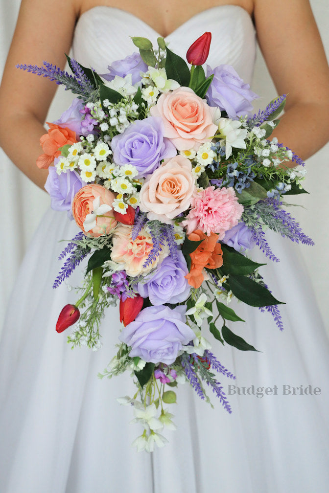 purple bridesmaid dresses with orange flowers Couldn't be more obsessed with the purple bridesmaids dresses mixed with colorful florals The vendor team: Coordinator- @caroline_michelle_14 Photo- @modernmomentsphoto Venue- @springsvenueedmond Florist- @fountain_floralsandevents Dress