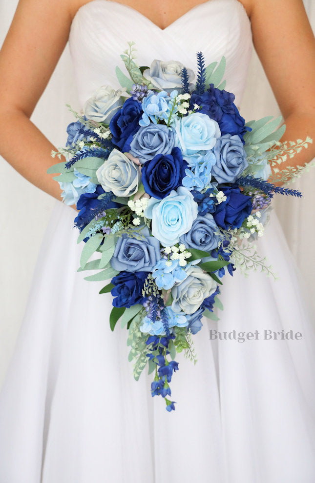 wedding flowers for blue bridesmaid dresses Pale Blue Bridesmaid Dresses and Tropical Bouquets
