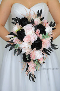 Light pink and black roses with babies breath wedding flower brides bouquet with roses and peonies and hydrangea and black foliage leaves