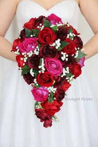 Red, Wine, burgundy and hot pink roses with babies breath wedding flower brides bouquet with roses and peonies