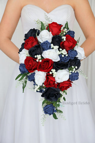 Wedding Bouquet with navy blue, white and red roses with babies breath and green leaves
