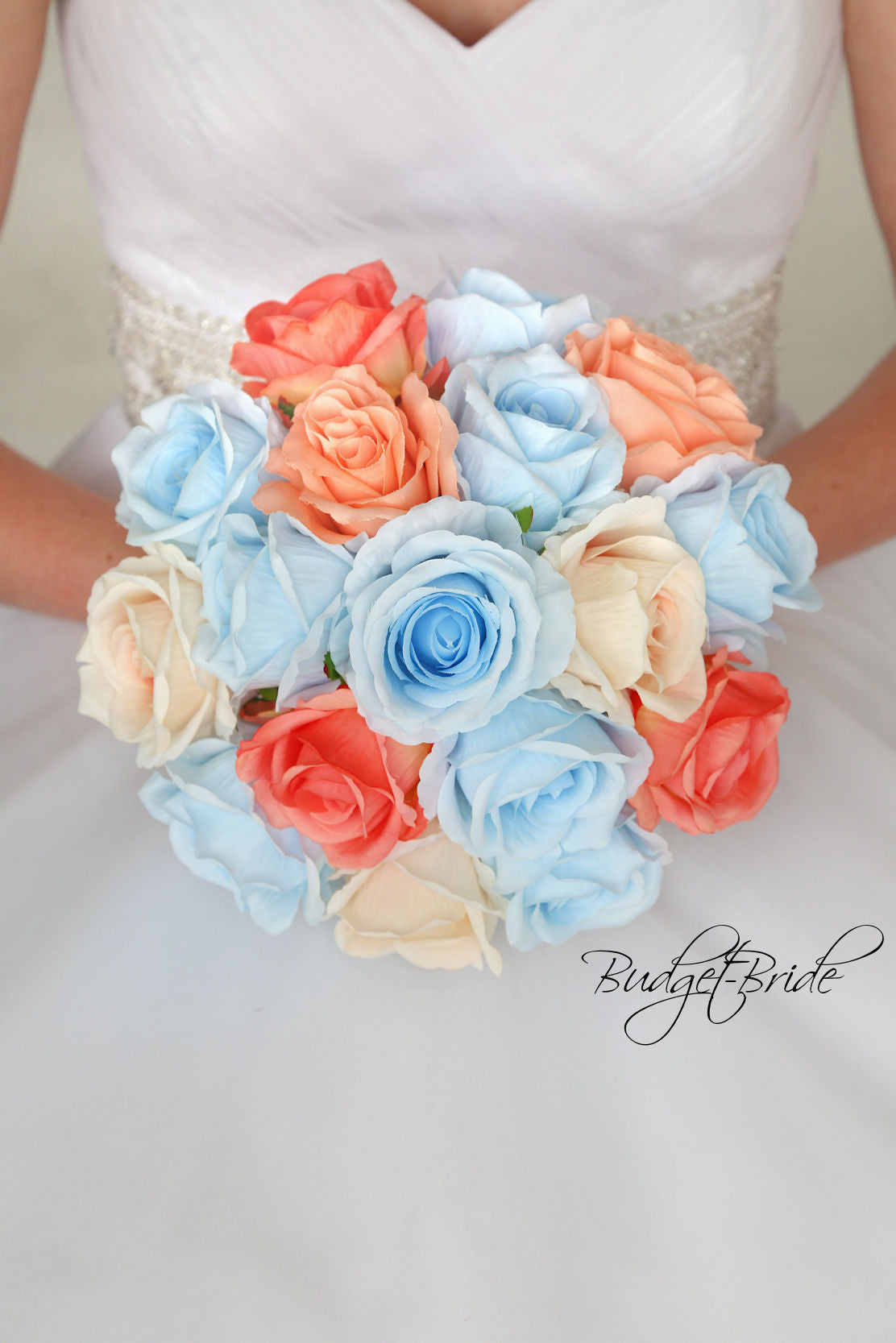 Silk flower bouquet with baby blue, peach and coral