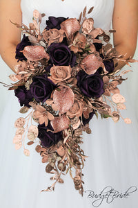 Wedding Flower Brides bouquet with Rose gold glitter calla lilies, rose gold glitter roses, rose gold leaves, plum roses, gold leaves and rose gold accents  with matching bridesmaids and boutonnieres for groom, groomsmen and mothers